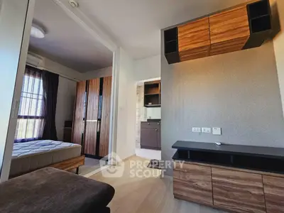 Modern apartment interior with stylish wooden furniture and open layout