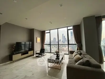 Spacious modern living room with stunning city skyline view and elegant decor.