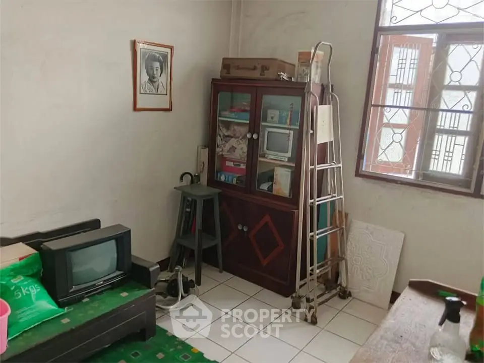 Cozy vintage living room with retro TV and classic decor