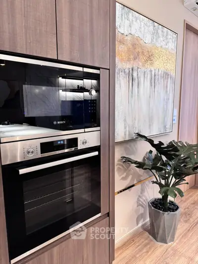 Modern kitchen with built-in Bosch oven and stylish decor