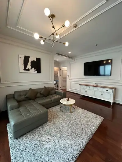 Elegant living room with modern decor and stylish lighting