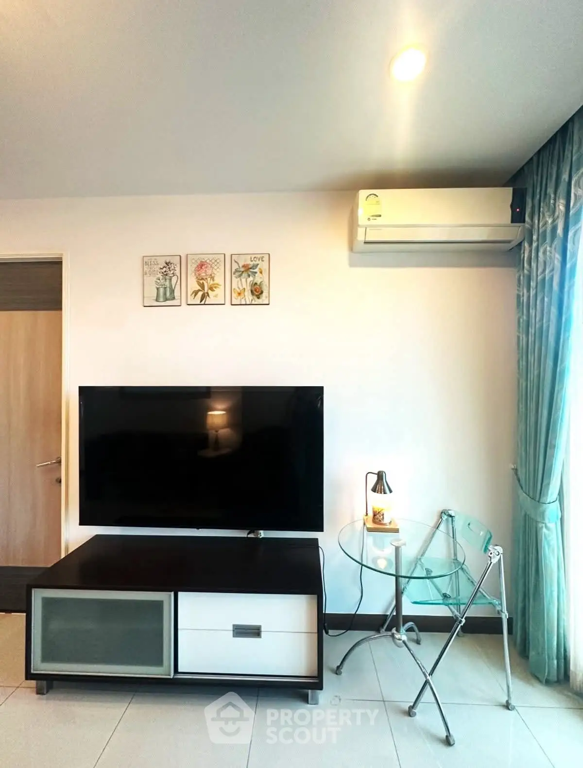 Modern living room with sleek TV setup and stylish decor