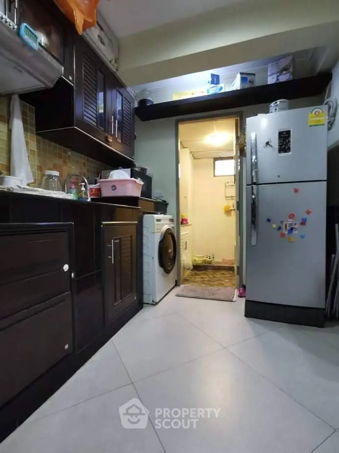 Modern elevator lobby with sleek design and ambient lighting