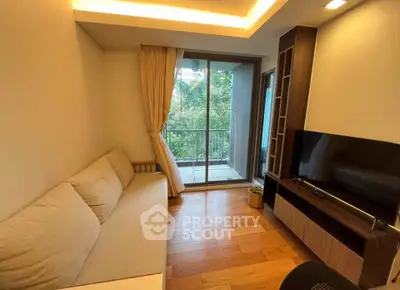 Cozy living room with modern decor and balcony view