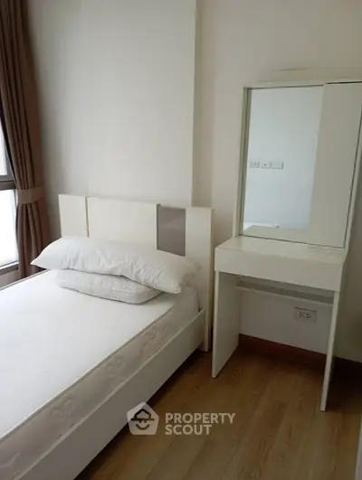 Cozy bedroom with modern furniture and natural light