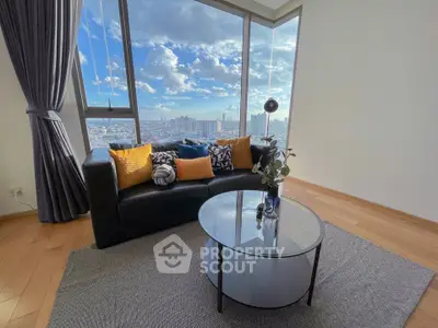 Stunning living room with panoramic city view and modern decor