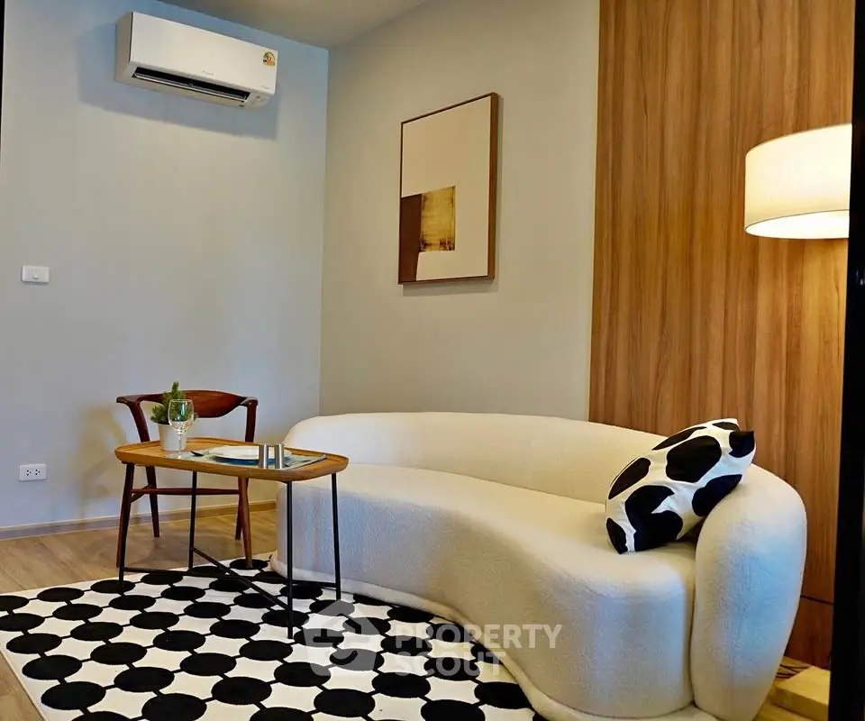 Stylish modern living room with unique sofa and chic decor