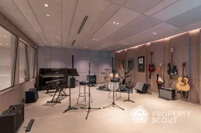 Luxurious home music studio with modern instruments and soundproofing, perfect for musicians and recording enthusiasts.