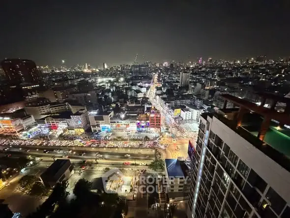 Stunning cityscape night view from high-rise building balcony