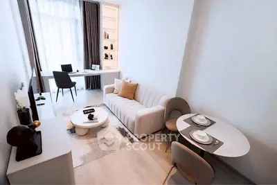 Modern living room with stylish furniture and natural light, perfect for urban living.