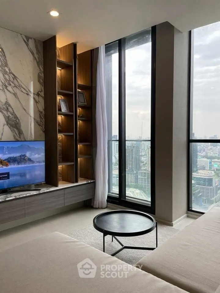 Luxurious living room with panoramic city view and elegant decor