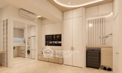 Modern living room with built-in storage and laundry area, featuring sleek design and neutral tones.