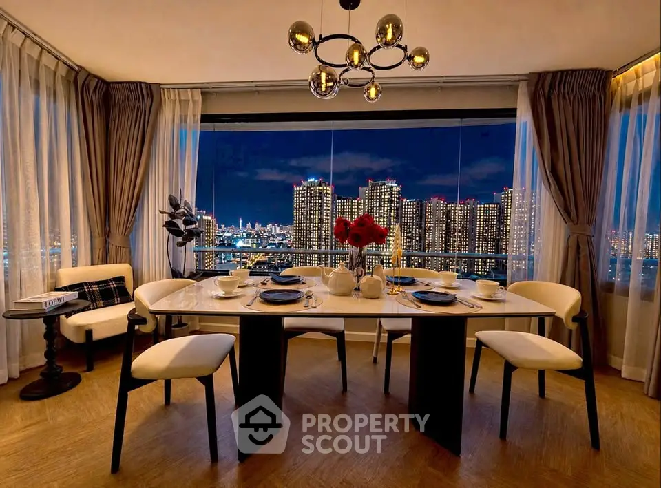 Luxurious dining room with stunning city skyline view, elegant decor, and modern lighting.