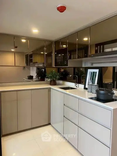 Modern kitchen with sleek cabinets and minimalist design