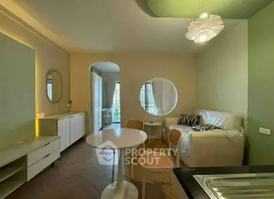 Stylish modern living room with unique circular window and chic furniture