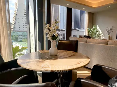 Luxurious living room with elegant round table and city view