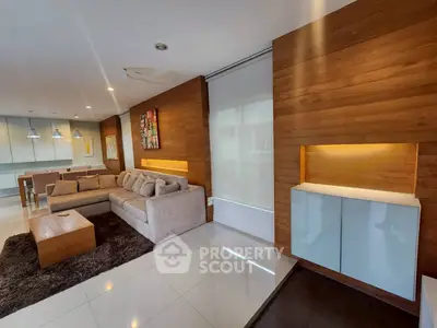 Modern living room with cozy sectional sofa and stylish wooden accents