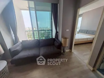 Modern apartment with cozy living room and stunning city view