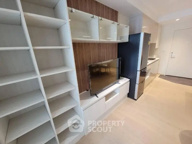 Modern apartment interior with sleek kitchen and stylish living area