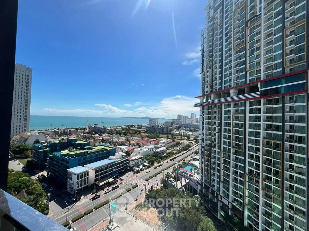 Stunning high-rise building with ocean view in vibrant cityscape