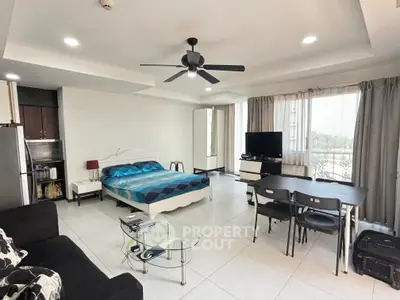 Spacious studio apartment with modern furnishings and natural light