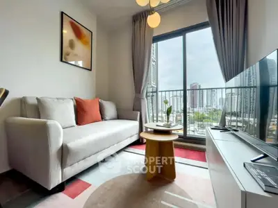 Modern living room with city view, stylish decor, and cozy seating area.