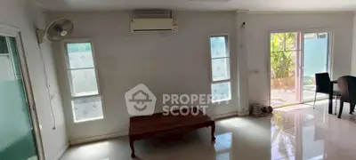 Spacious living room with air conditioning and natural light