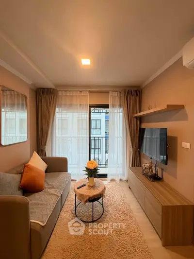 Cozy living room with modern decor and large window view