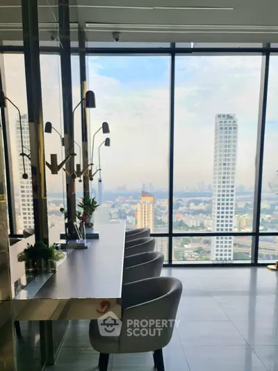 Luxurious high-rise apartment with stunning city view and modern interior design.
