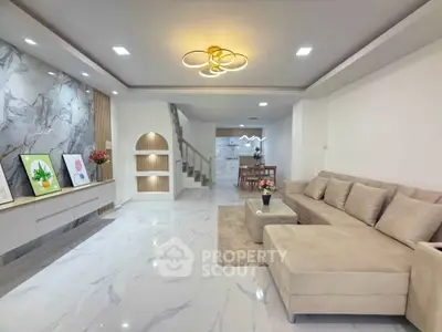 Luxurious modern living room with elegant marble flooring and stylish lighting