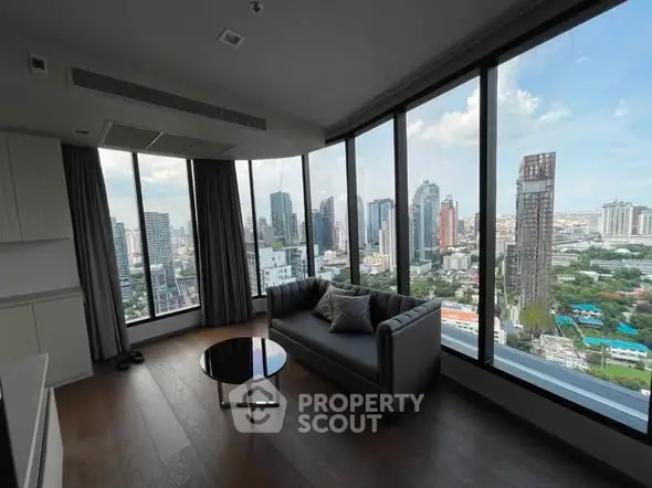 Stunning corner unit with panoramic city views and modern interior design.