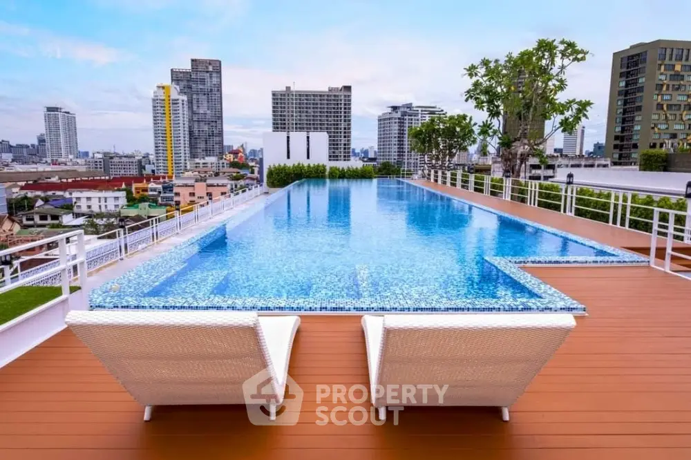 Stunning rooftop infinity pool with city skyline views