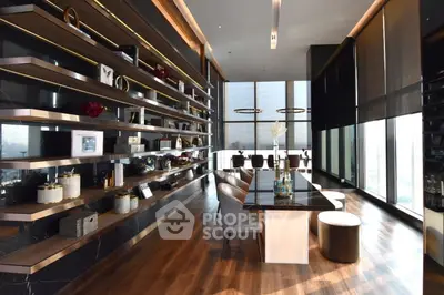 Luxurious modern living room with floor-to-ceiling windows and elegant decor