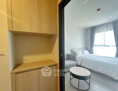 Modern bedroom with cozy bed and stylish furniture in a bright apartment