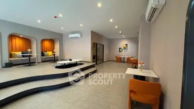 Modern interior with stylish seating and air conditioning in a spacious room