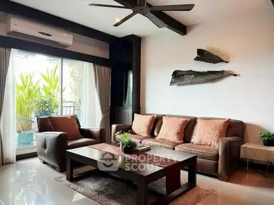 Elegant living room with modern furniture and large window view