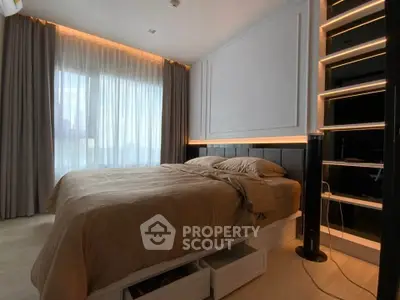 Modern bedroom with elegant lighting and large window view