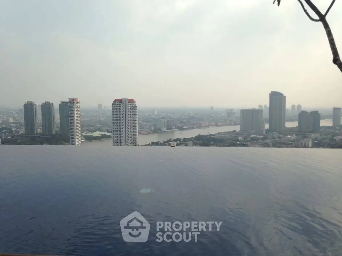 Stunning infinity pool with breathtaking city skyline view