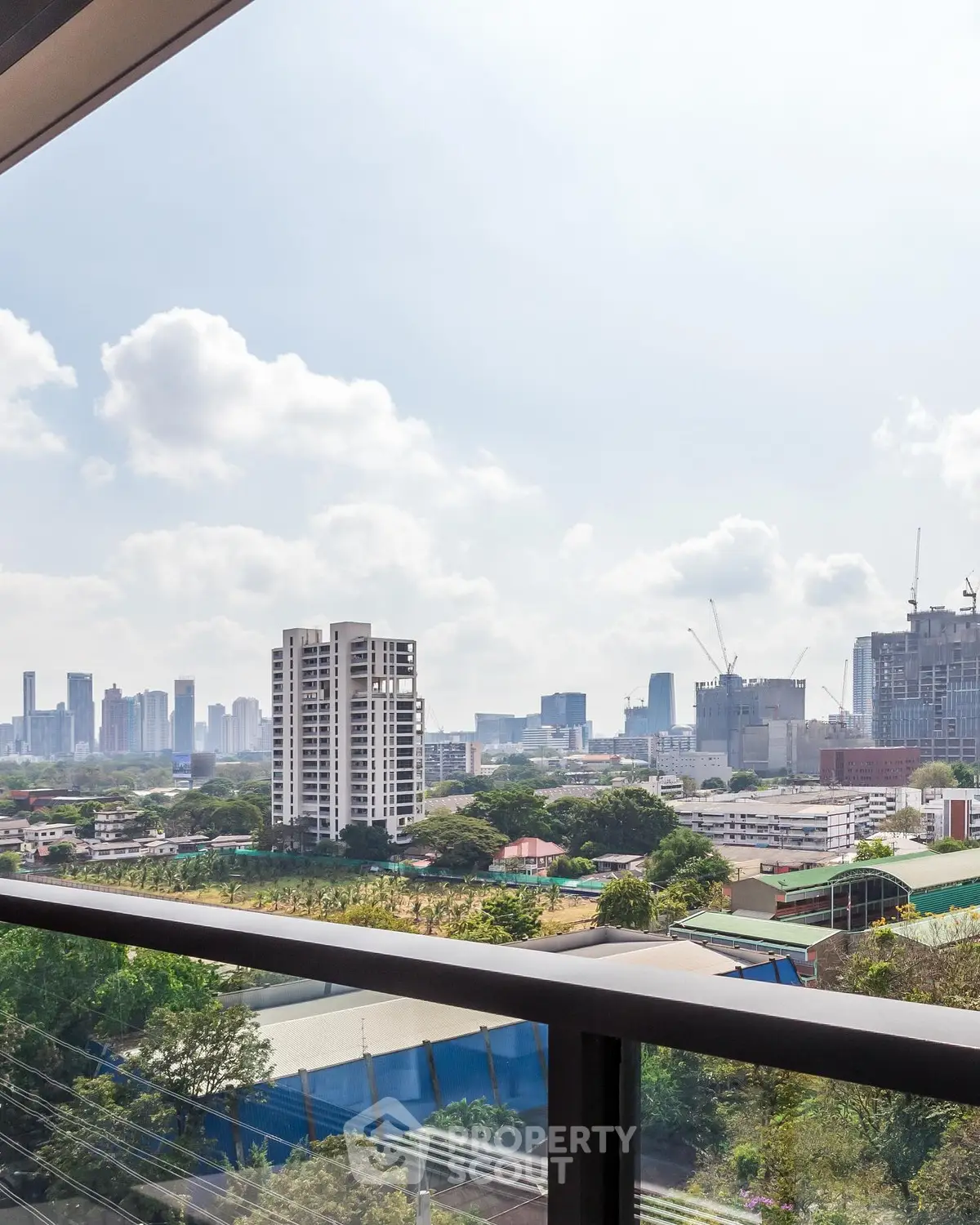 Stunning cityscape view from a modern balcony, perfect for urban living.