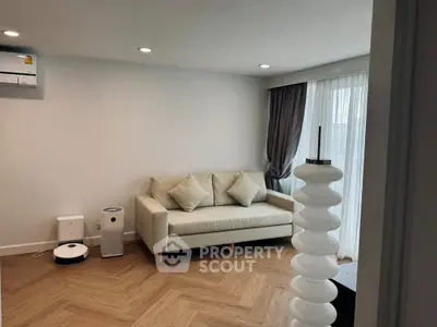 Modern living room with stylish decor and natural light