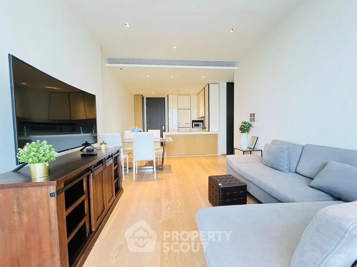 Spacious modern living room with open kitchen and stylish decor