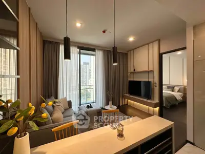 Modern open-plan living room with elegant decor and city view, featuring cozy seating and stylish lighting.