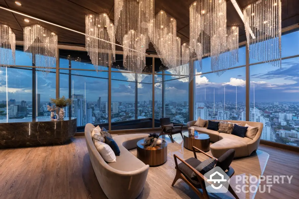 Luxurious penthouse living room with panoramic city views and elegant chandeliers