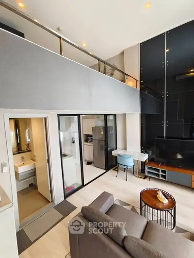 Modern loft-style living room with mezzanine and sleek interior design