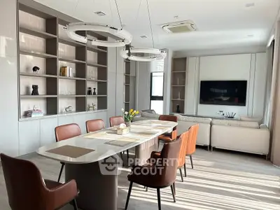 Luxurious modern living room with elegant dining area and stylish decor