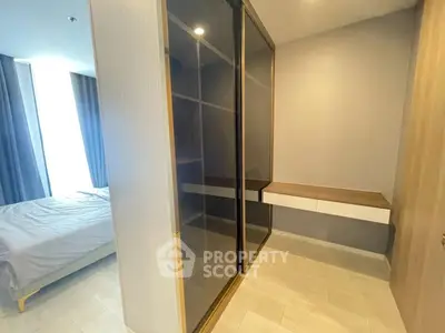 Modern bedroom with sleek built-in wardrobe and minimalist design
