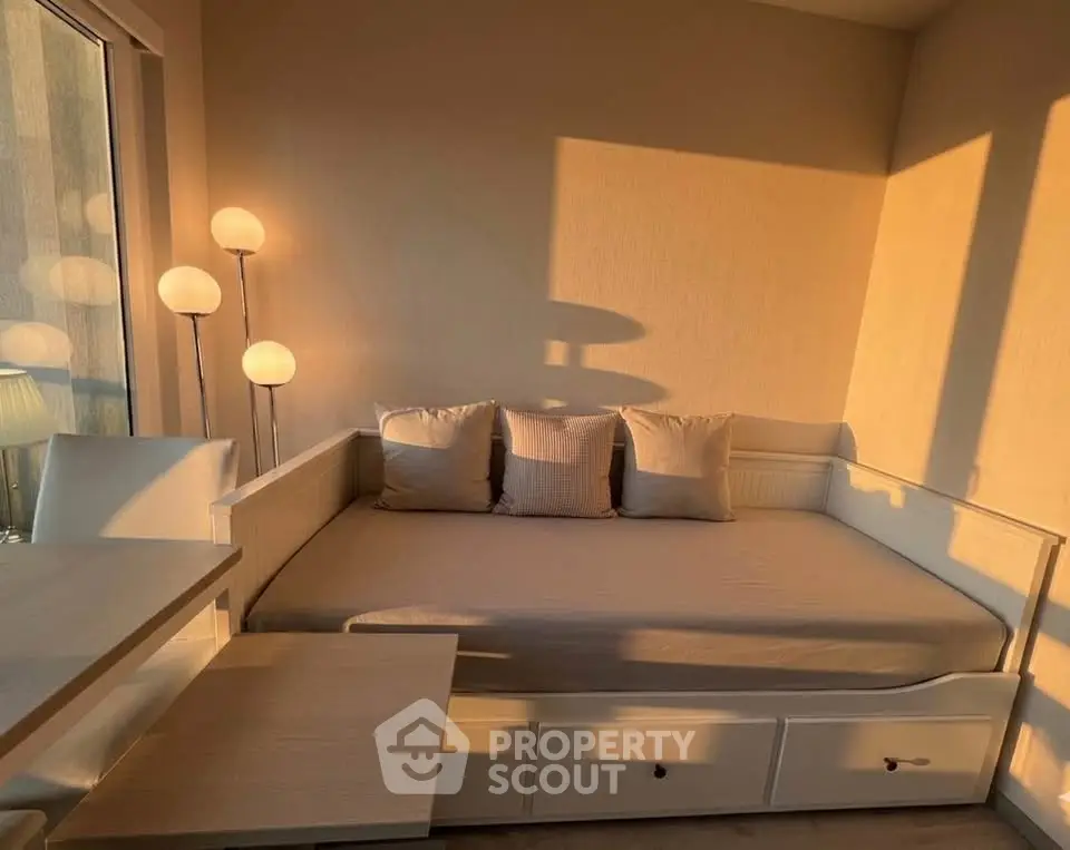Cozy sunlit bedroom with modern furniture and stylish decor