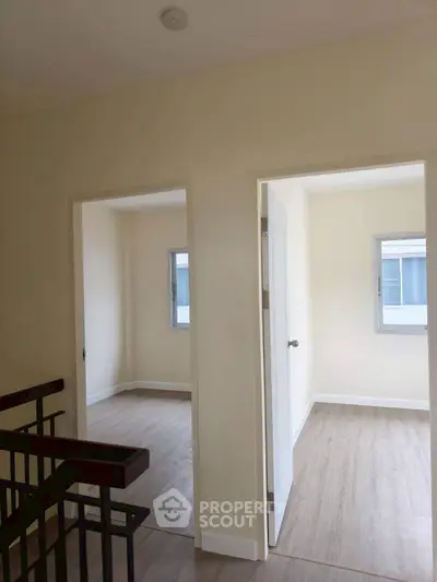 Bright and airy interior with two rooms and modern flooring