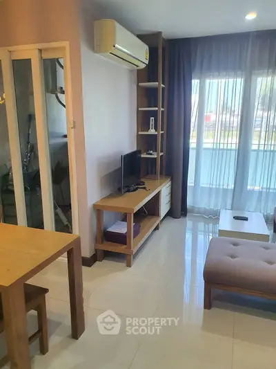 Modern living room with air conditioning and natural light