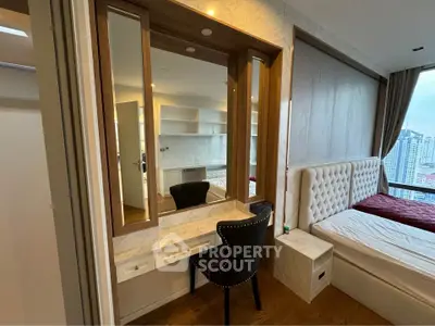 Luxurious bedroom with elegant vanity and city view in modern apartment
